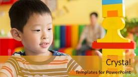  Presentation with building blocks - Theme enhanced with building blocks 1 - portrait of cute toddler boy background and a gold colored foreground