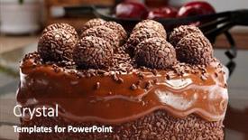  Presentation with chocolate - Amazing PPT theme having chocolate-cake-with-bonbon-brigadeiro backdrop and a tawny brown colored foreground