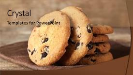  Presentation with chocolate chip cookies - Presentation design enhanced with chocolate chip cookies on a brown napkin on wooden table background and a coral colored foreground