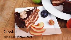  Presentation with table grape - Audience pleasing PPT layouts consisting of chocolate cream brownie cake layers slice topped with white chocolate and cream flowers decorated with fruits apple plum and grape on plate on wooden table with big whole cake backdrop and a coral colored foreground