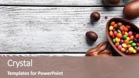  Presentation with rabbit - PPT theme featuring chocolate easter eggs rabbit background and a coral colored foreground