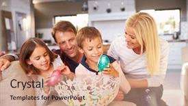  Presentation with home black family - Audience pleasing PPT theme consisting of chocolate egg - family celebrating easter at home backdrop and a coral colored foreground