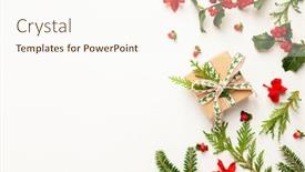  Presentation with christmas holly - PPT theme consisting of christmas background with gift box branches of fir tree evergreens and holly with red berries on white winter festive nature concept flat lay copy space background and a cream colored foreground