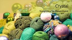  Presentation with thread - Colorful PPT theme enhanced with christmas decoration colorful thread and glass balls under the light backdrop and a yellow colored foreground