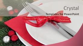  Presentation with oak - PPT theme featuring christmas dinner place setting with white plates cutlery red bow ribbon fir and bauble decorations over oak background background and a soft green colored foreground