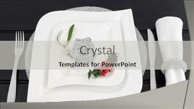  Presentation with holly - Audience pleasing slide deck consisting of christmas dinner table setting with white china plates cutlery linen serviette and ring holly mistletoe and silver gift box bauble decoration with bead strand over dark wood background backdrop and a light gray colored foreground