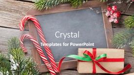  Presentation with cane - Slide deck featuring christmas gift box candy cane and snow fir tree on wooden table top view with chalkboard for your greetings background and a gray colored foreground