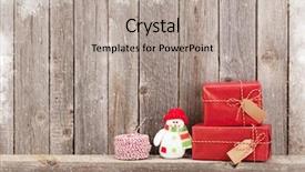  Presentation with wooden toy - Audience pleasing PPT theme consisting of christmas gift boxes and snowman backdrop and a light gray colored foreground