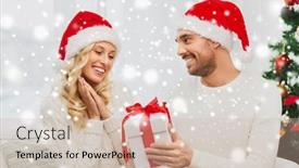  Presentation with christmas holidays - Colorful slide deck enhanced with christmas holidays and people concept - happy couple in santa hats with gift box sitting on sofa at home backdrop and a soft green colored foreground