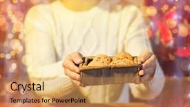  Presentation with baking cookies - Amazing PPT theme having christmas holidays baking people and food concept - close up of woman with oat cookies sitting at wooden table over lights backdrop and a coral colored foreground