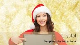  Presentation with laptop blank screen - Beautiful presentation featuring christmas holidays technology advertisement and people concept - smiling woman in santa helper hat pointig finger to blank laptop computer screen over yellow lights background backdrop and a lemonade colored foreground