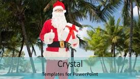  Presentation with tropical christmas - PPT theme having christmas holidays travel and people concept - man in costume of santa claus with gift box showing thumbs up gesture over swimming pool on tropical beach background background and a light blue colored foreground