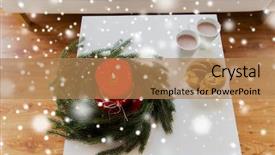  Presentation with christmas chocolate - Presentation consisting of christmas holidays winter and still life concept - close up of fir wreath with burning candle oat cookies and cups with hot chocolate or cocoa drink on table at home background and a coral colored foreground