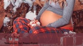  Presentation with pregnant woman - Theme enhanced with christmas-miracle-pregnant-woman-sitting background and a tawny brown colored foreground