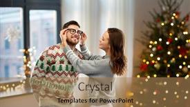  Presentation with christmas holidays - Cool new PPT theme with christmas people and holidays concept - happy couple in ugly sweaters over home background backdrop and a coral colored foreground