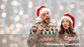  Presentation with christmas party - PPT theme having happy couple in ugly sweater background and a violet colored foreground
