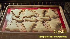  Presentation with christmas baking - Slides with christmas shaped sugar cookies baking in an oven selective focus on the cookies baking on the baking sheet background and a tawny brown colored foreground