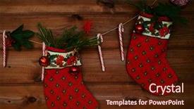  Presentation with wooden toy - Beautiful PPT theme featuring christmas socks sugar canes toy bubbles and other decorations on wooden background backdrop and a tawny brown colored foreground