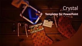  Presentation with bound - PPT theme with christmas socks sugar canes toy bubbles on wooden background and touchpad bound with red ribbon held by santa background and a wine colored foreground