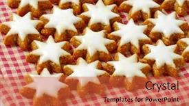  Presentation with checkered tablecloth - Audience pleasing theme consisting of close up brown almond shaped - christmas star cookies on checkered backdrop and a red colored foreground