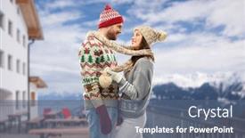  Presentation with knitted clothes - PPT theme enhanced with christmas winter clothes and holidays concept - happy couple tied with scarf in ugly sweaters knitted hats and mittens over ski resort in austrian alps mountains background background and a ocean colored foreground