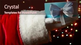  Presentation with gift - Presentation theme consisting of christmas wish - santa claus hand holding gift background and a  colored foreground