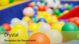  Presentation with children on plastic waste - Beautiful PPT theme featuring chute design - colorful plastic balls backdrop and a  colored foreground