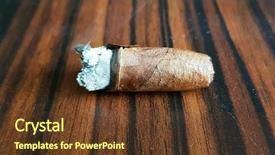  Presentation with cuban - Amazing PPT layouts having cigar resting on an ashtray backdrop and a tawny brown colored foreground