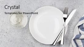  Presentation with table setting - Presentation with clean slate - table setting empty plate knife background and a light gray colored foreground