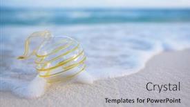  Presentation with beach ball - Slide set with clear christmas glass ball on beach with seascape background background and a light gray colored foreground