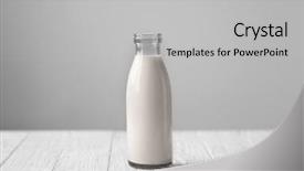  Presentation with milk in bottle - Amazing PPT theme having clear glass - bottle of fresh milk backdrop and a light gray colored foreground