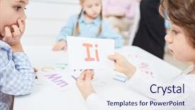  Presentation with kids alphabet - Cool new presentation theme with clever little kids learning english backdrop and a sky blue colored foreground