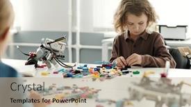  Presentation with robot electronic - PPT theme with clever-schoolboy-sitting-by-desk background and a  colored foreground