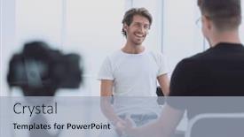  Presentation with interview - Cool new slides with close up a young businessman gives an interview in the office backdrop and a light blue colored foreground