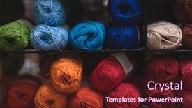  Presentation with yarn - Amazing slide set having close-up-multicolored-ball backdrop and a tawny brown colored foreground