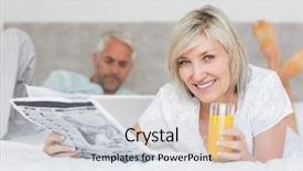  Presentation with newspaper laptop - Amazing slide deck having close-up of a woman reading newspaper with man using laptop in background in bed at home backdrop and a lemonade colored foreground