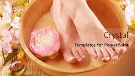  Presentation with fluid - Amazing PPT theme having close-up of beautiful female feet in wooden bowl filled with fluid cosmetics flowers all around concept of natural spa treatment backdrop and a coral colored foreground