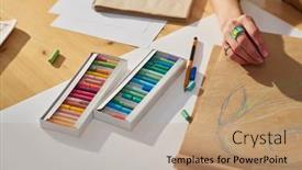  Presentation with crayon - Theme featuring close-up-of-hand background and a  colored foreground