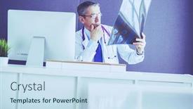  Presentation with roentgen - Cool new presentation theme with close-up-of-male-doctor backdrop and a sky blue colored foreground