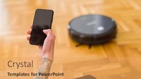  Presentation with robot electronic - PPT theme with close up of man hands controling automatic vacuum cleaner using electronic control of the mopping robot background and a yellow colored foreground