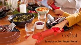  Presentation with generation - Slide set having close up of multi generation family pulling christmas crackers as they sit for meal at table background and a red colored foreground
