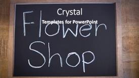  Presentation with slate - PPT theme having close-up of slate with flower shop sign in the flower shop background and a dark gray colored foreground