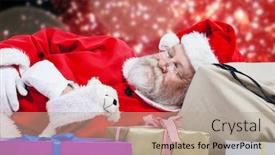  Presentation with red stars - Slides consisting of close-up of tired santa claus sleeping beside christmas presents against white snow and stars on red background and a mint green colored foreground