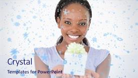  Presentation with falling snow - PPT theme featuring close up of woman holding a present against a white background against snow falling background and a sky blue colored foreground