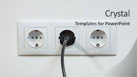  Presentation with power plug - PPT theme with close up photo of a black power plug plugged in a triple electric socket background and a light gray colored foreground