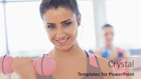  Presentation with weight lifting - PPT theme enhanced with close-up portrait of a smiling woman lifting dumbbell weight with friend in background at a gym background and a coral colored foreground