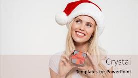  Presentation with white christmas - PPT theme having close up portrait of a smiling dreaming woman in red christmas hat holding present box and looking away at copy space isolated over white background background and a coral colored foreground