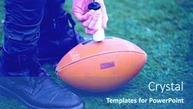  Presentation with football field - PPT layouts with close up shot of man on the field pumping air into a professional ball for american football background and a ocean colored foreground