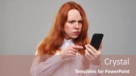  Presentation with red telephone - PPT theme consisting of close-up shot of an indignant redhead girl pointing at the screen of telephone girl isolated over background in the studio pretty girl with long red hair and freckles background and a coral colored foreground