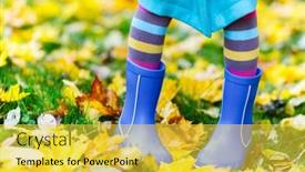  Presentation with autumn blue - Presentation theme with close up of a little girl in colorful clothes and blue boots outdoors at beautiful autumn park background and a yellow colored foreground